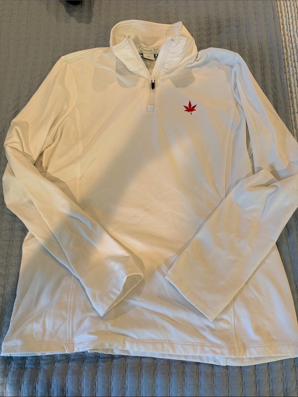 Boast White Quarter-Zip Long Sleeve Top with Red Leaf Accent